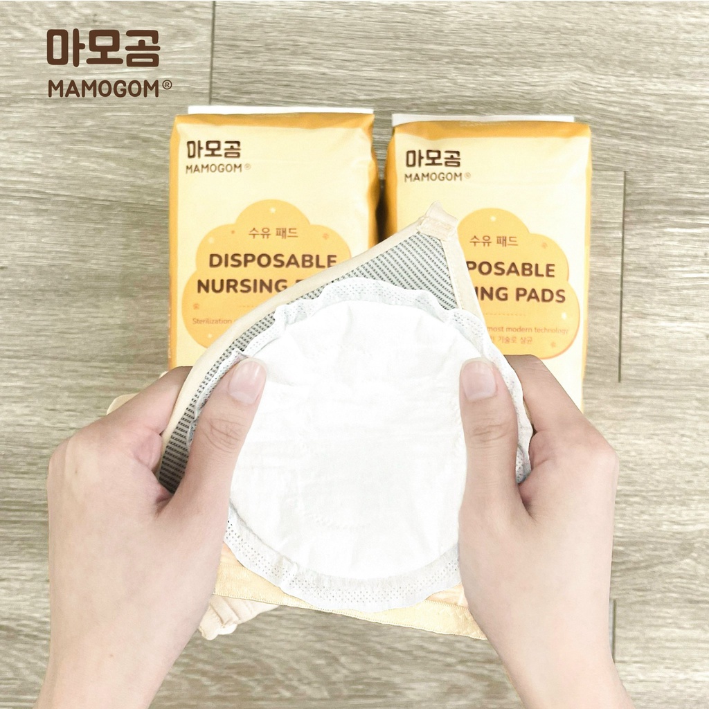 100 Miếng lót thấm sữa Mamogom mỏng 1.5mm kết cấu 3 chiều màng PE ngăn ngừa vi khuẩn cao cấp với phụ nữ cho con bú 100c