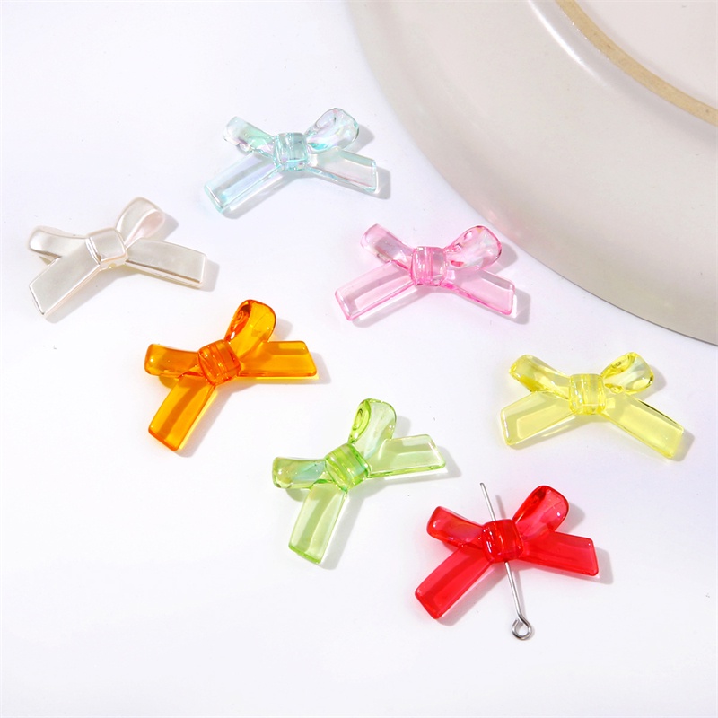Set 4 hạt acrylic trong suốt hình nơ 34x20mm dùng làm trang sức thủ công