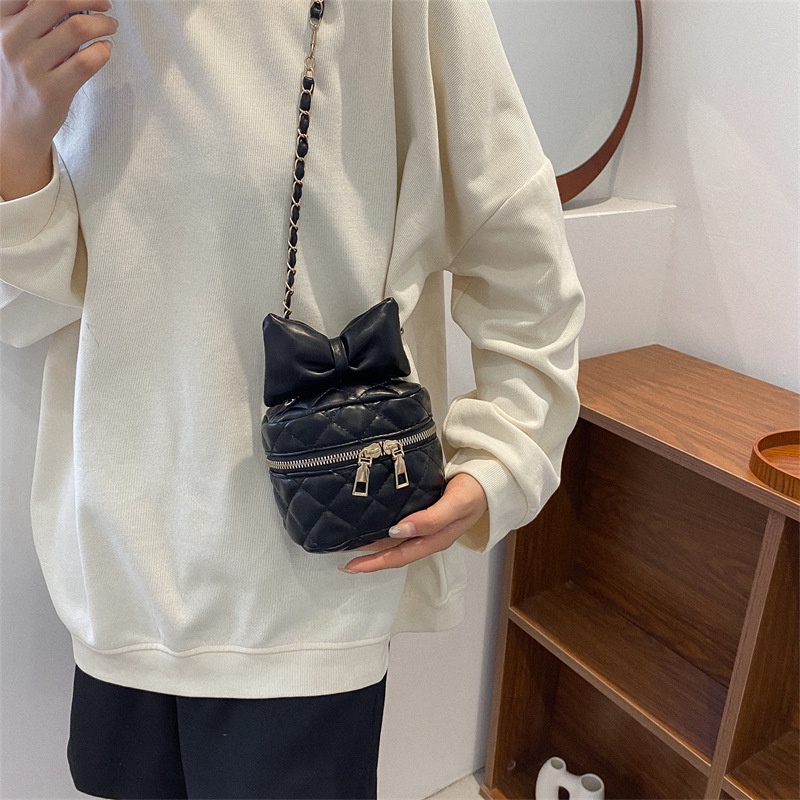 Túi Xách JASMIN NOIR đeo chéo vai hình trụ in họa tiết sọc caro phối nơ hợp thời trang cho nữ