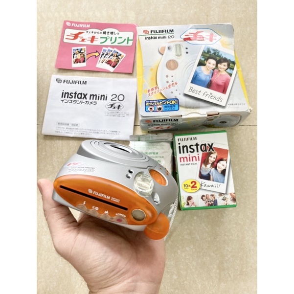 Máy chụp ảnh lấy liền Fujifilm Instax Mini 20 Cheki , tặng hộp film 10 tấm, tặng Pin CR2, tặng dây đeo