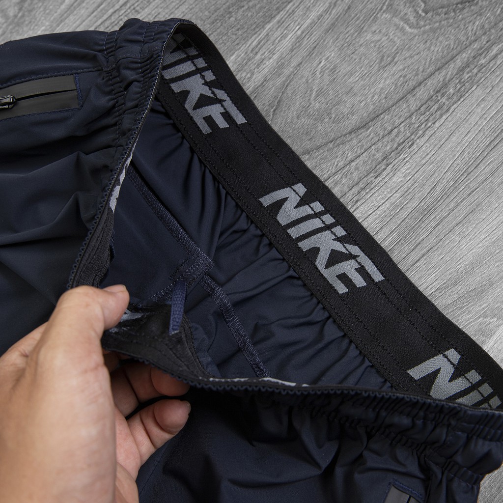 Quần short đùi thể thao nam chất gió co giãn 4 chiều cao cấp thoáng mát mặc mua hè Ni túi zip su | BigBuy360 - bigbuy360.vn