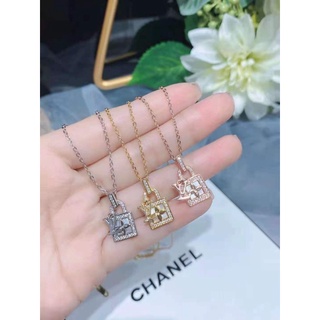 Dây chuyền titan Lv mạ vàng + trắng