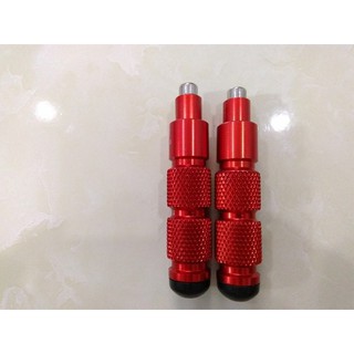 Gù chống đổ sau xe máy