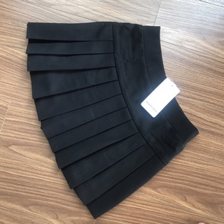 Chân váy xếp ly to nhỏ