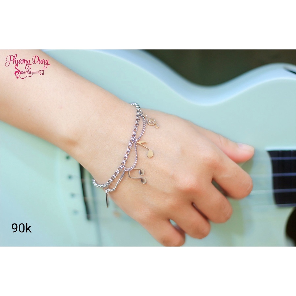 Vòng tay 4 nốt nhạc - màu vàng và màu trắng