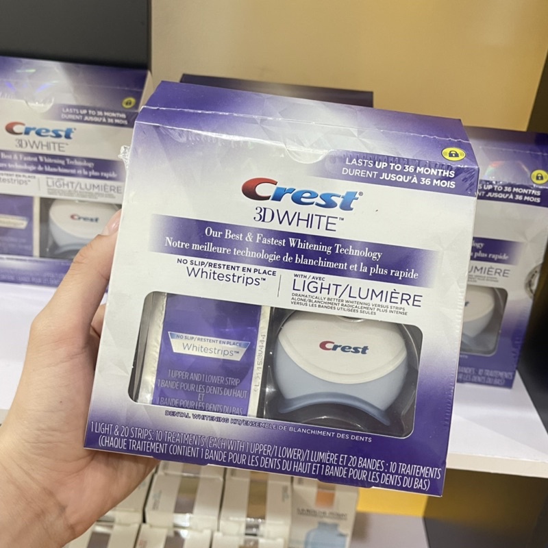 Miếng dán kèm máy chiếu làm trắng răng Crest 3D White 20 Whitestrips &amp; 1 Light