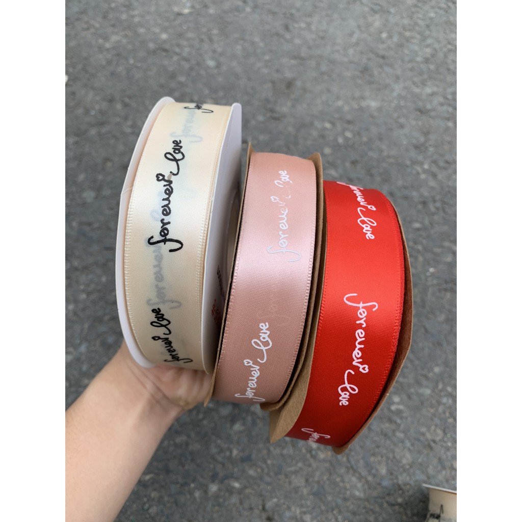 1 cuộn Ruybang lụa 2.5cm chữ  đẹp dài 50m