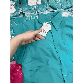 Váy xanh tay hến
