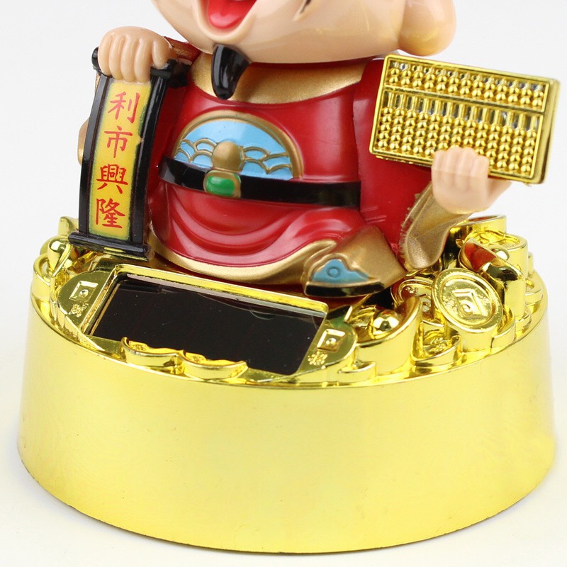 Tượng thần tài gật đầu năng lượng