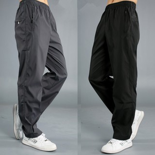 Quần nam mùa hè mỏng quần thể thao l-4xl quần chống gió nam hàn quốc quần thường ngày phong cách hồng kông thanh niên kích thước lớn polyester bề mặt dép một lớp quần nhanh khô quần áo nam