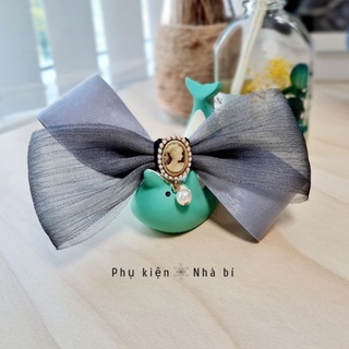 Cột/ kẹp tóc nơ Nhà bí