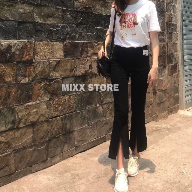 Quần skinny đen ống loe xẻ giữa hàng QC