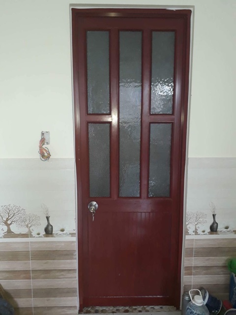 Cửa đi nhôm hệ 700 nhôm trắng sữa và nhôm màu gỗ