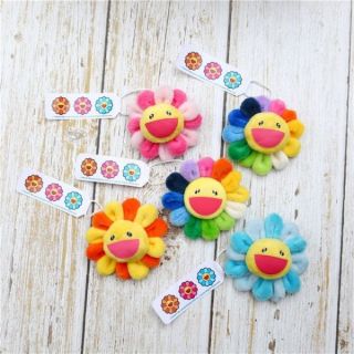 Cài áo hình hoa mặt cười