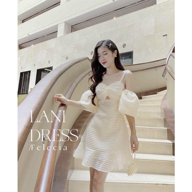 Đầm nude hai dây rớt tay phồng xoắn ngực khoét