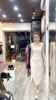 Váy nẹp lệch be nhạt cchat