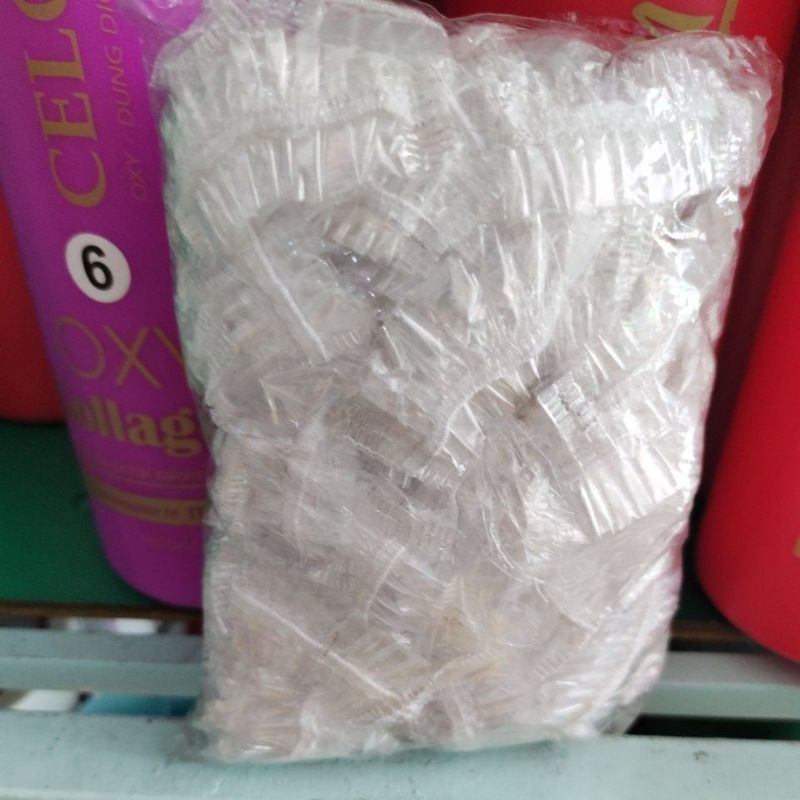 Bịch 100 cái  bao trùm vành tai, giúp tai ko bị vào nước khi tắm , gội hoặc làm hoá chất