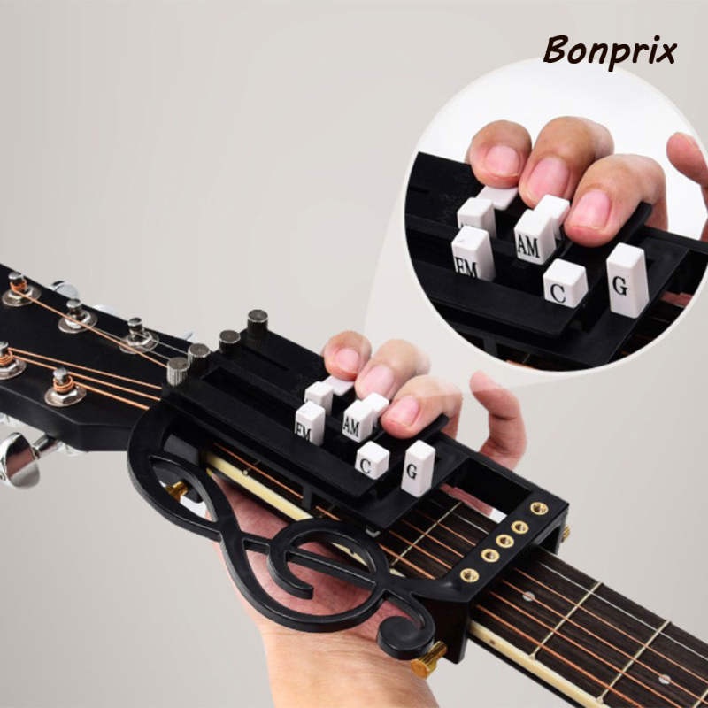 Dụng cụ dạy học đàn guitar acoustic với một phím bấm tiện ích