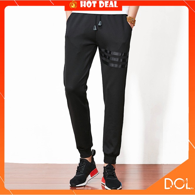 [Mã SKAMSALEP6 giảm 10% TỐI ĐA 100K đơn150K] Quần jogger nam thể thao co dãn dáng thể thao in 3 sọc cá tính New | BigBuy360 - bigbuy360.vn