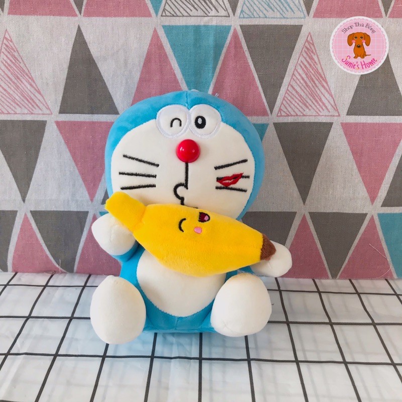 Gấu Bông Doraemon Ôm Trái Cây 20x13cm