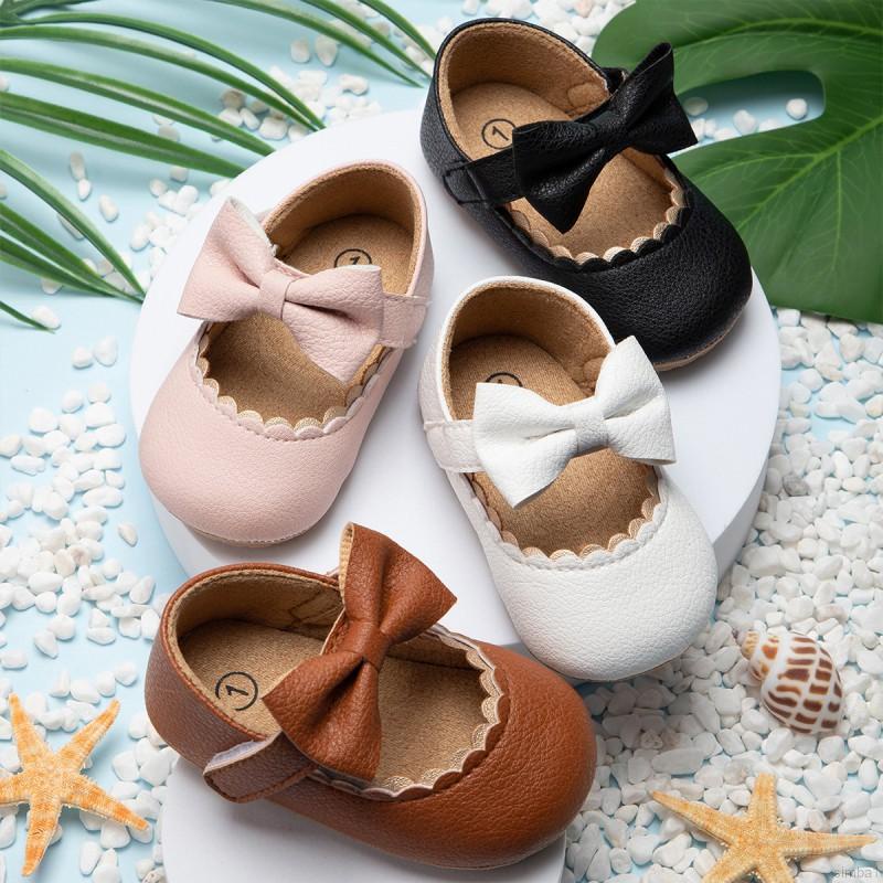 Giày búp bê da PU đính nơ đế mềm chống trơn cho bé gái 0-18 tháng tuổi