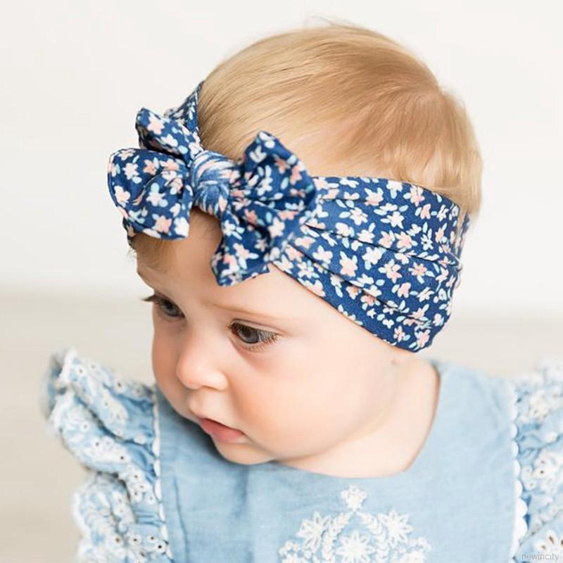 Băng đô nơ hoa dễ thương cho bé gái