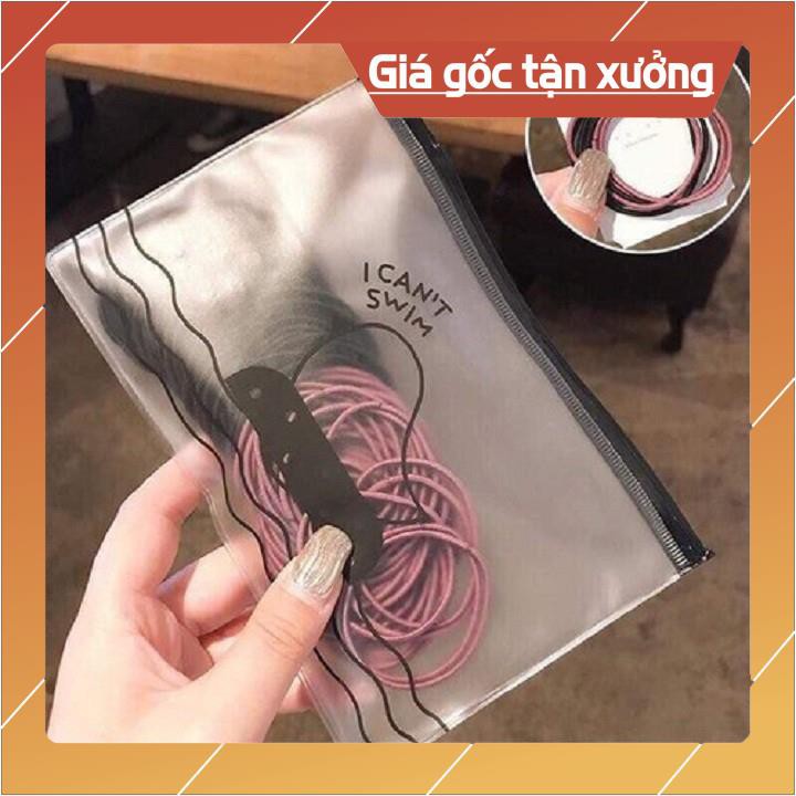 Buộc tóc 100 cái có túi zip đựng tiện lơi