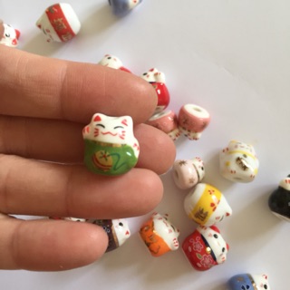 Mèo gốm thần tài