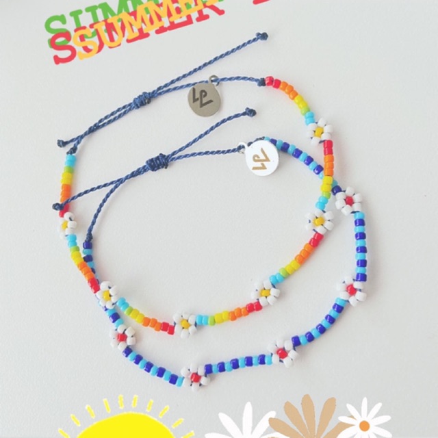 [Whiteline] Vòng tay Summer Daisy Rainbow/Navy (có size Chân)