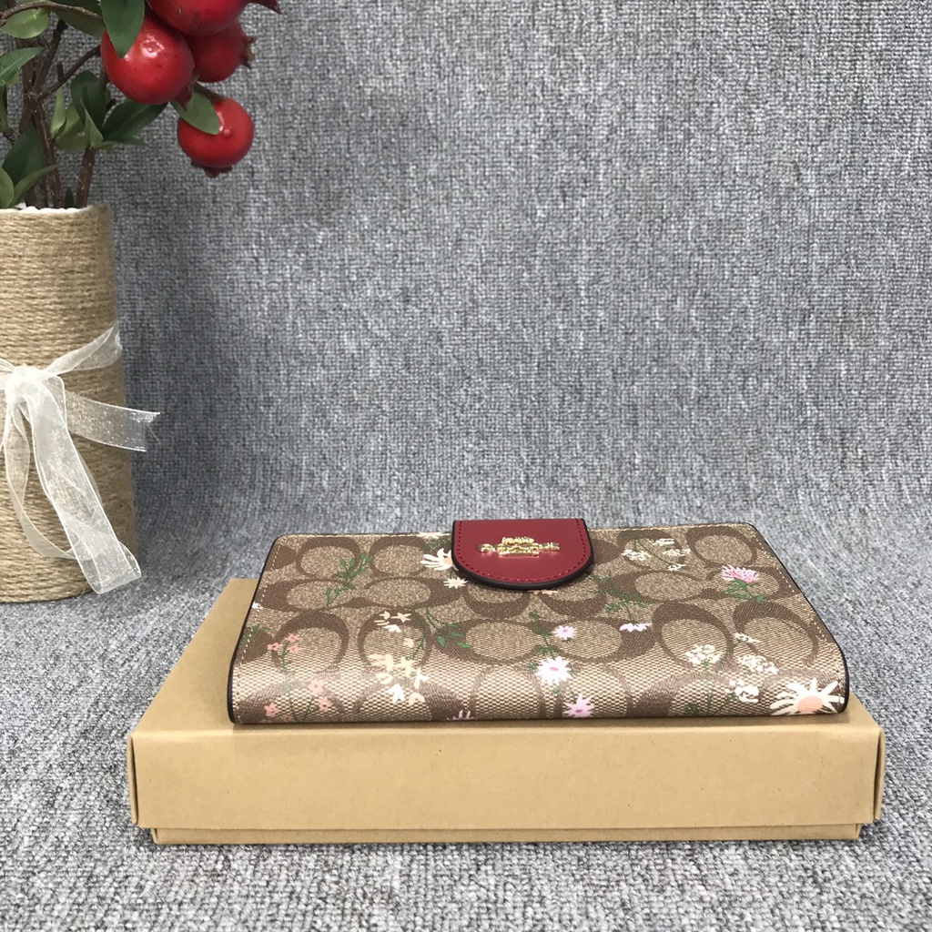 Ví clutch nữ cầm tay Coach có dây đeo cổ tay hàng xuất dư xịn có ngăn đựng điện thoại