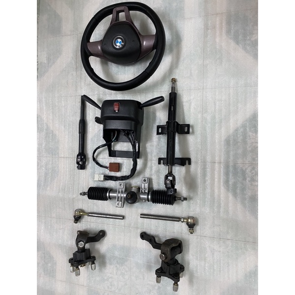 Bộ Hệ thống lái vô lăng xe 4 bánh đầy đủ,mai ơ tim ốc đo vuông 7cm,chéo 10cm,dùng chế xe 4 bánh lái vô lăng