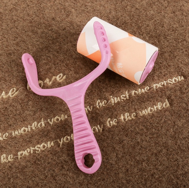 Cây lăn lấy lông - bụi trên quần áo , vật dụng