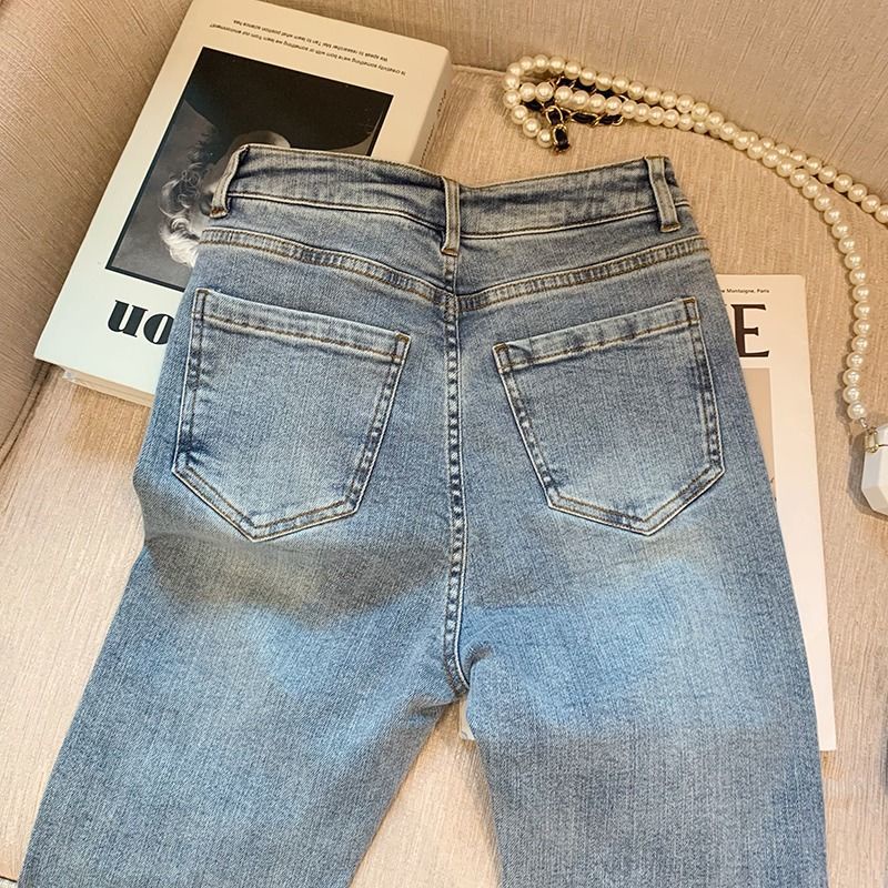 Quần Jean Nữ Lưng Cao Ống Loe Xẻ Tà Đính Hạt Thời Trang Mùa Hè Kiểu Mới