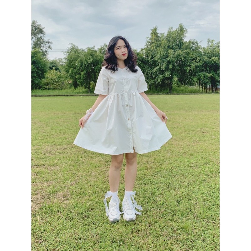 Đầm babydoll trắng cúc trước