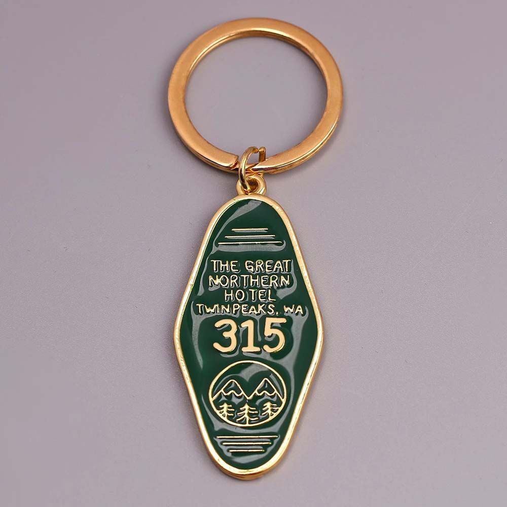 Móc khóa logo GIOVANNI Twin Peaks The Great Northern khách sạn màu xanh lá tráng men 315