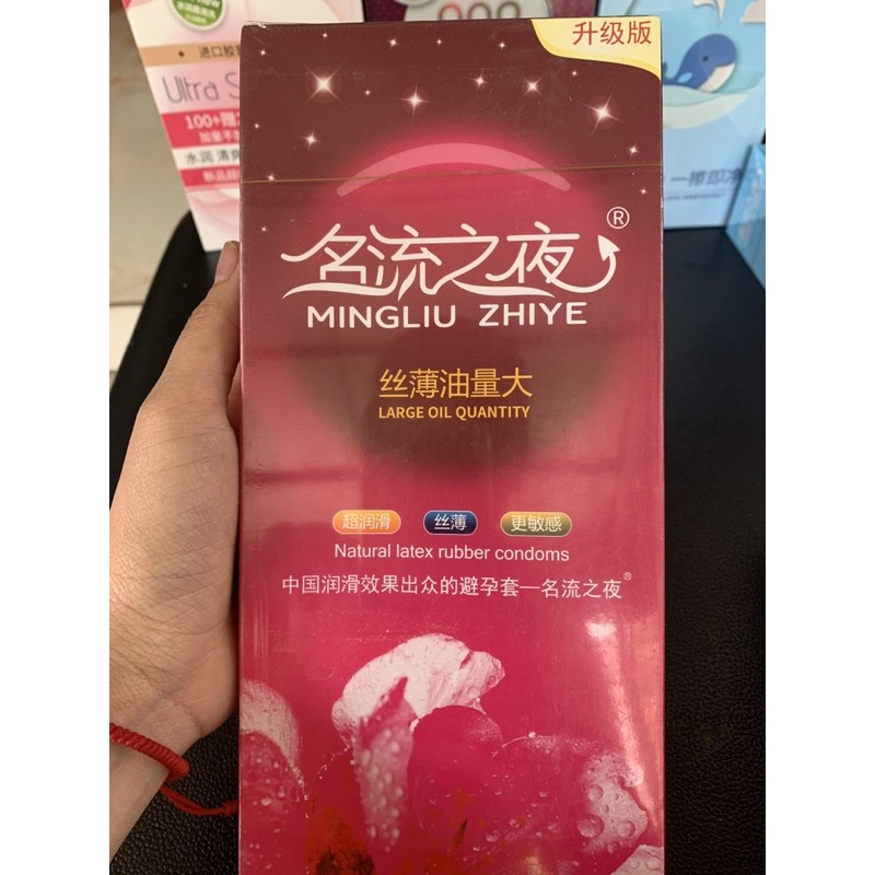 Bao cao su Trung Quốc màu đỏ mẫu cũ gốc dầu , bsc nhiều dầu chất bôi trơn hộp 100 cái