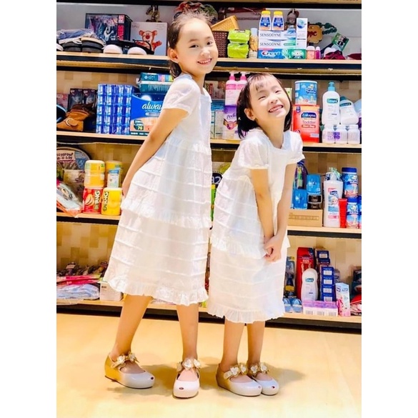 Váy trắng 3 tầng Bé