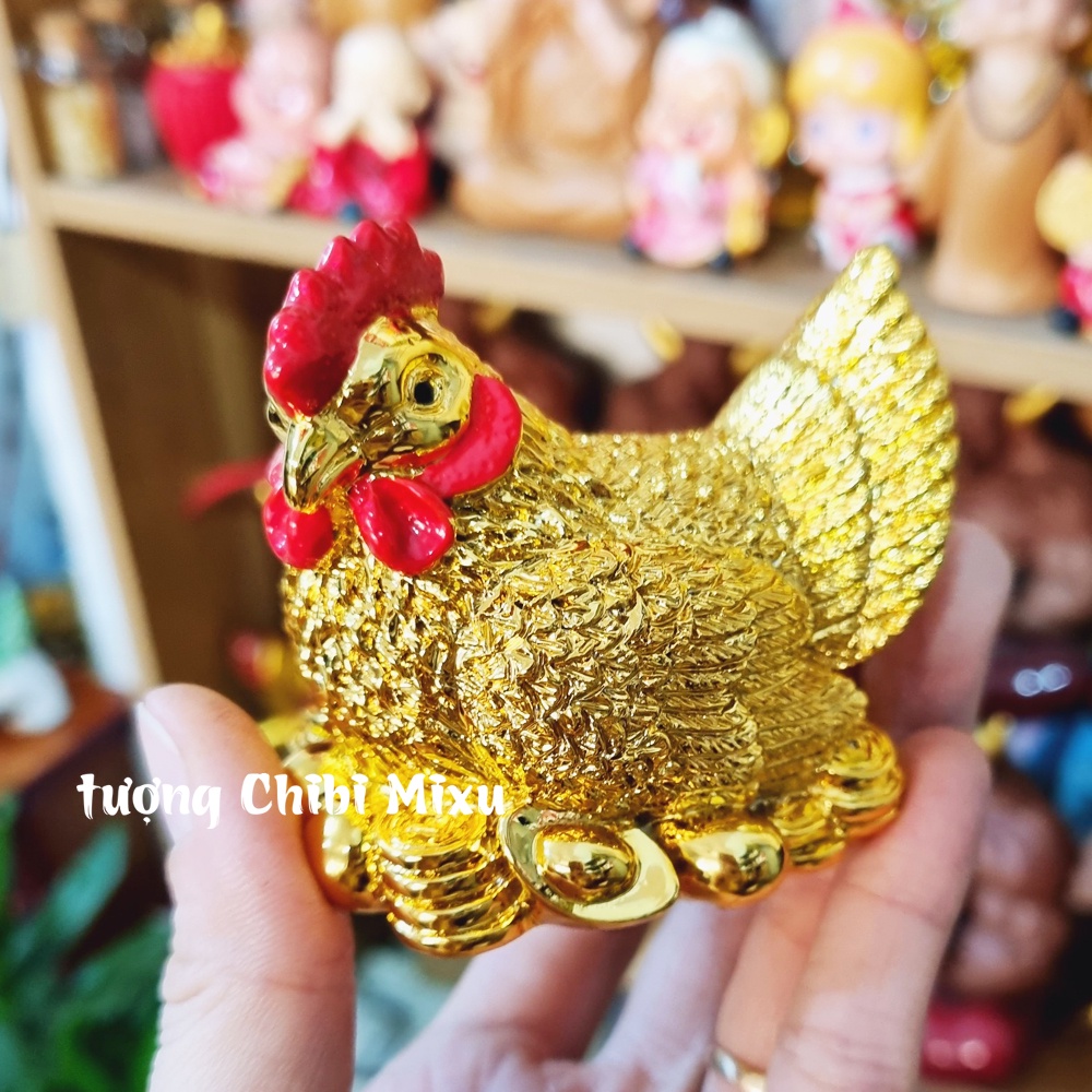 Tượng gà mái ấp trứng vàng may mắn tài lộc