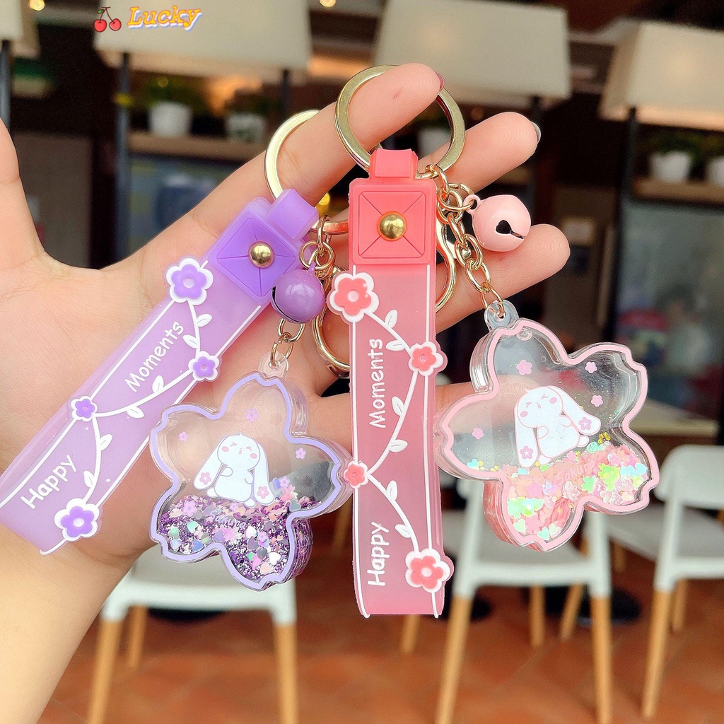 Móc khóa hình thỏ hoạt hình phối hoa anh đào kiểu cát lún nhiều màu thời trang
