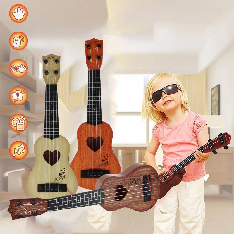 Đàn Ghi Ta Ukulele Mini Họa Tiết Trái Tim