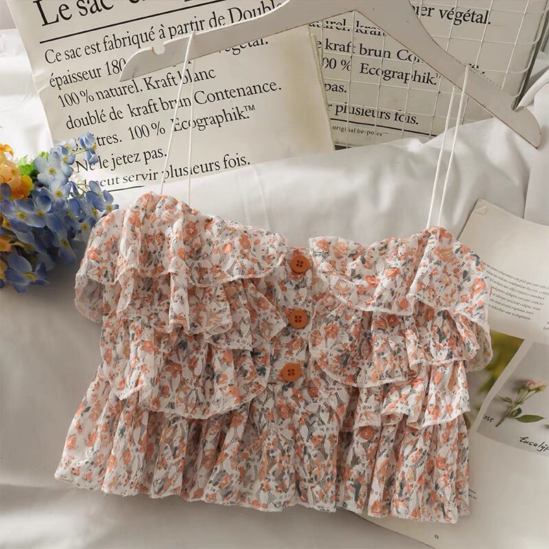 Áo  dây hoa nhí tầng bèo như đoá hoa-vải mềm,mịn,có hàng cúc giữa và khoá sau lưng