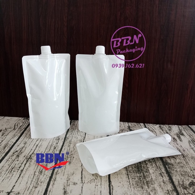 50 túi đáy đứng có nắp vặn trắng sữa 1000ml 16x25 cm.