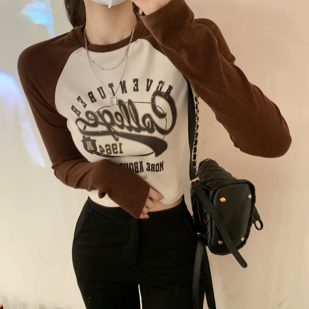 Áo thun tay dài in họa tiết màu sắc tương phản đầy phong cách cho nữ