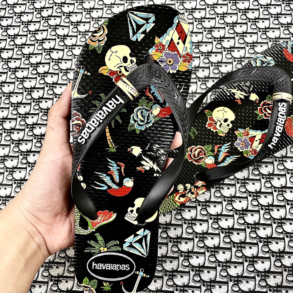 Dép xỏ ngón nam Havanas hoạ tiết đầu lâu in 3D, phù hợp đi biển bền bỉ êm chân thời trang cá tính.