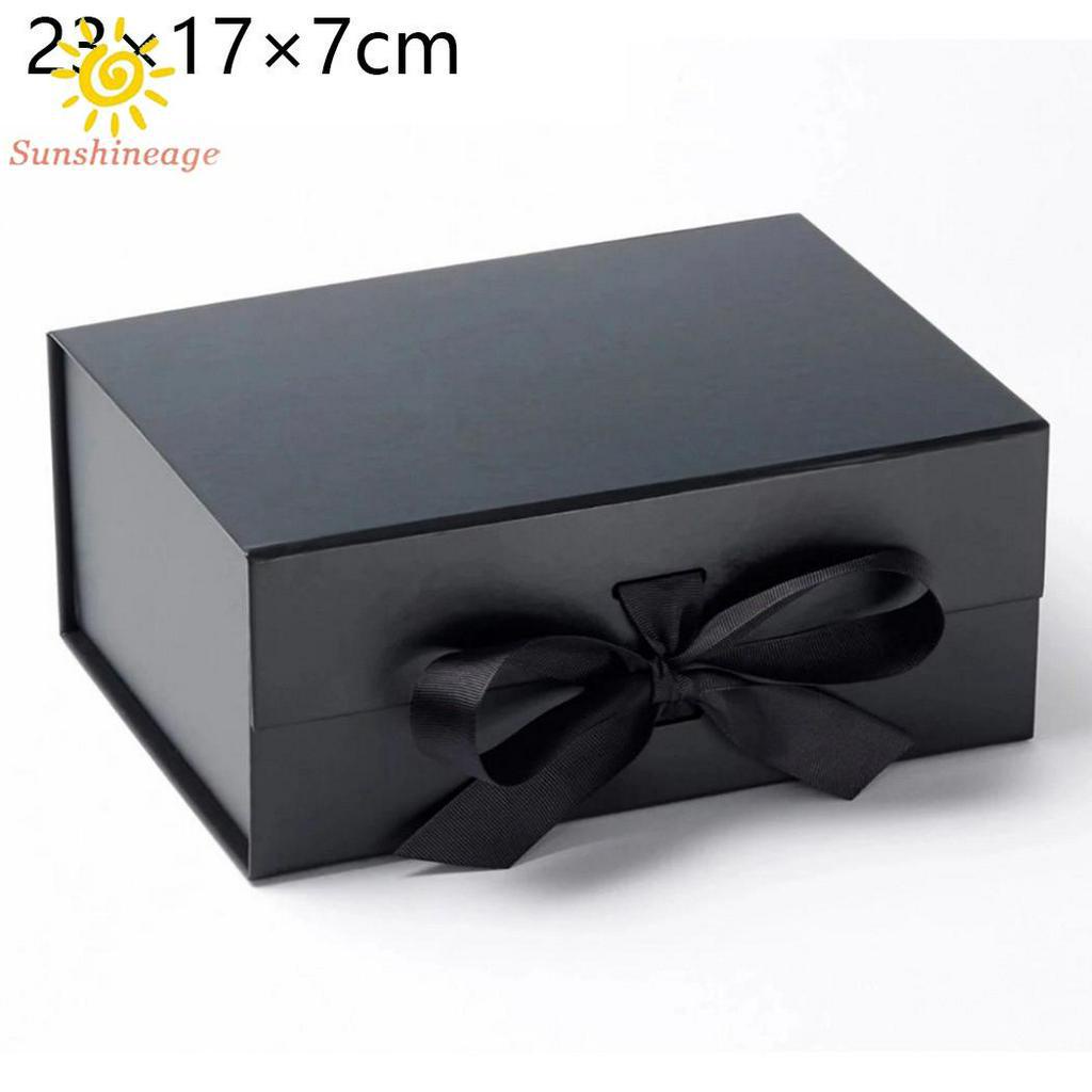 Hộp quà chất liệu dày cứng cỡ 23 * 17 * 7cm có nam châm kèm dây ruy băng