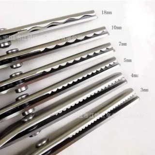 Kéo răng cưa cắt vải