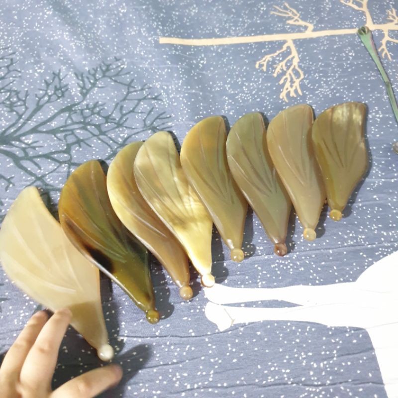 cạo gió day huyệt sừng