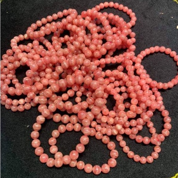 Vòng tay nữ đá phong thủy màu hồng vân đào hoa