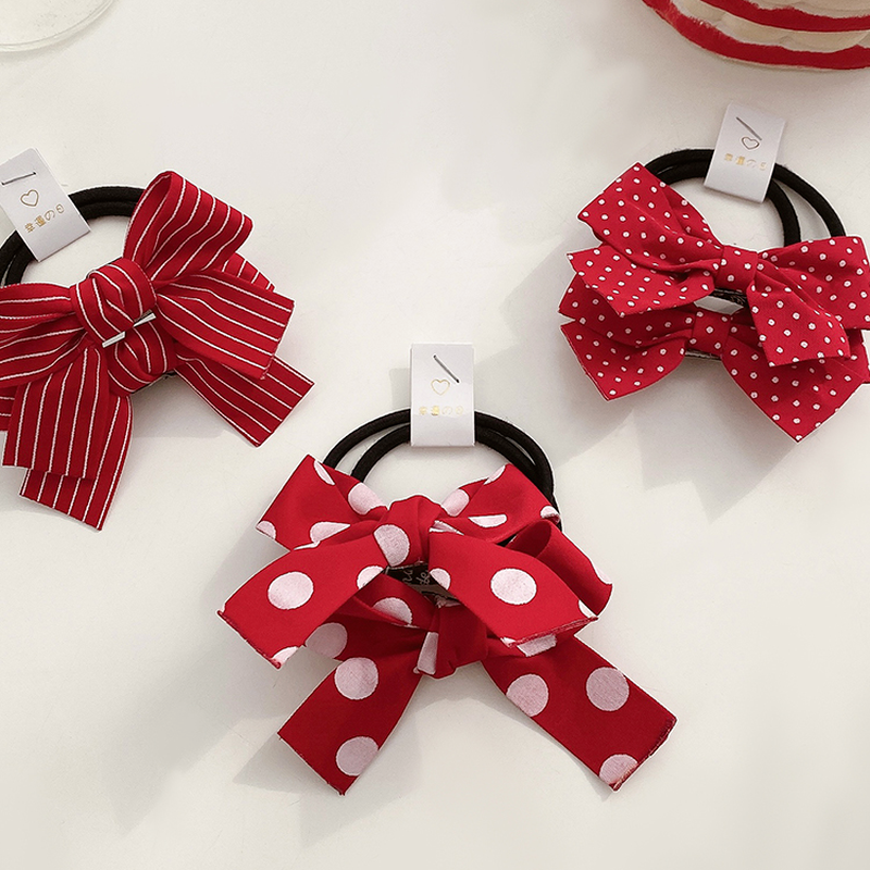 Thun cột tóc gắn nơ dễ thương phong cách Hàn Quốc