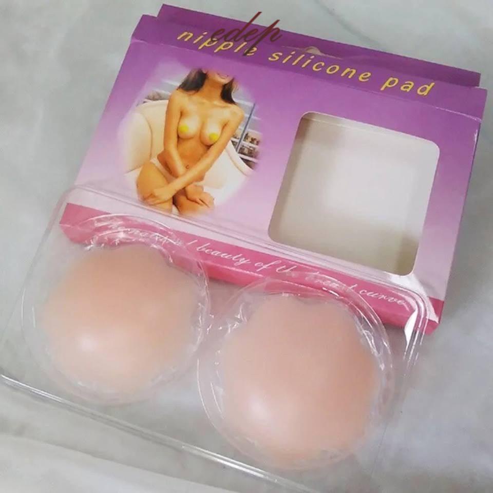 Hộp gồm 2 Miếng dán nhũ hoa silicon hình hoa mai , dán ti đi biển